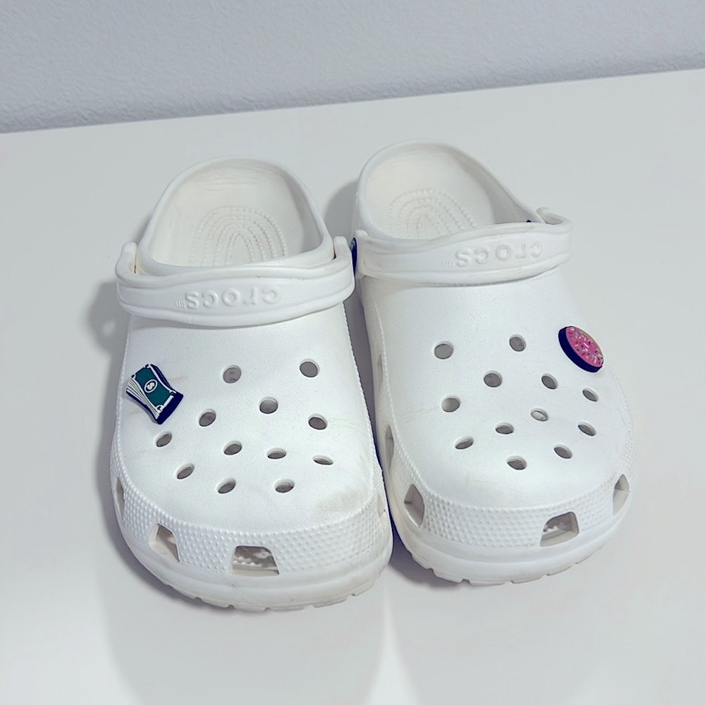 White crocs w/ 2 jibbits.